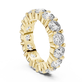 The Stella round lab-grown diamond eternity wedding band in yellow gold, view 1