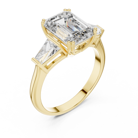 The Clara emerald-cut lab-grown diamond engagement ring with baguette side stones in yellow gold