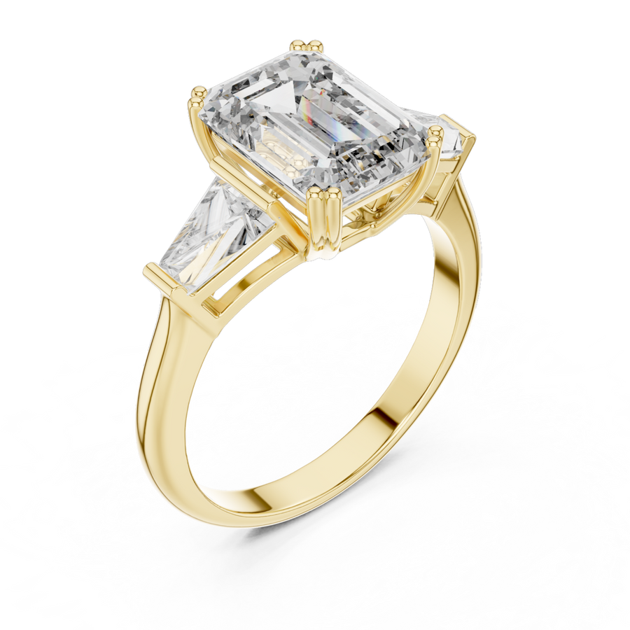 The Clara emerald-cut lab-grown diamond engagement ring with baguette side stones in yellow gold