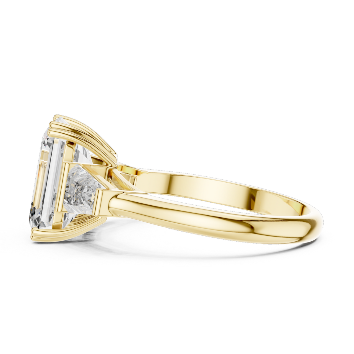 The Clara emerald-cut lab-grown diamond engagement ring with baguette side stones in yellow gold