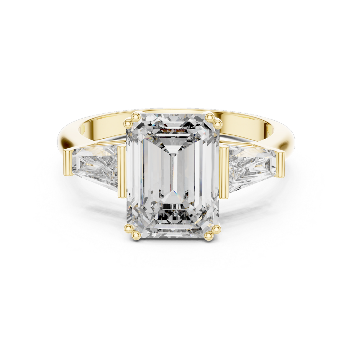 The Clara emerald-cut lab-grown diamond engagement ring with baguette side stones in yellow gold