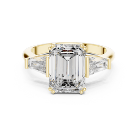 The Clara emerald-cut lab-grown diamond engagement ring with baguette side stones in yellow gold