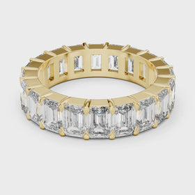 The Luna emerald-cut lab-grown diamond eternity band in yellow gold — rotating view